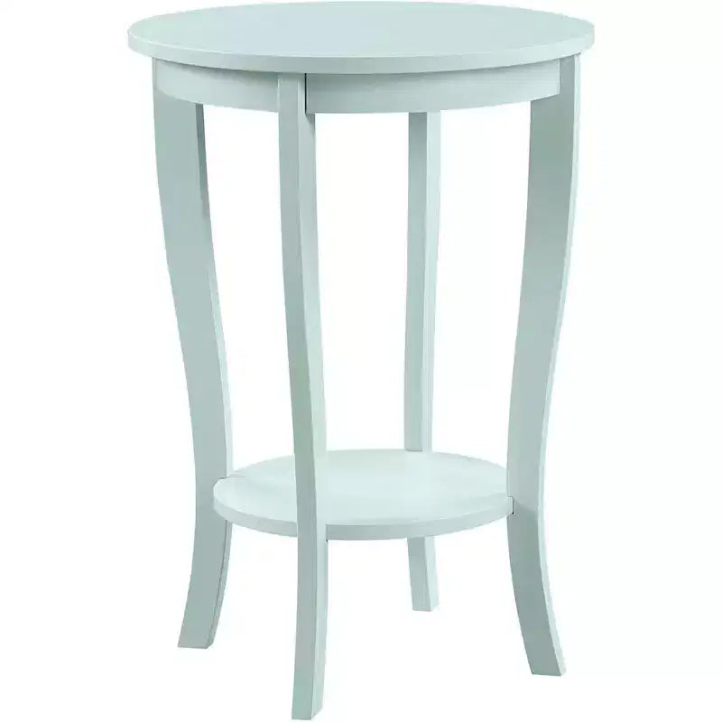 Table d'appoint ronde Belmont avec étagère inférieure, pieds incurvés et finition lisse, idéale pour les coins de salon ou de chambre.