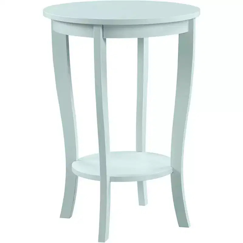 Table d'appoint ronde Belmont avec étagère inférieure, pieds incurvés et finition lisse, idéale pour les coins de salon ou de chambre.